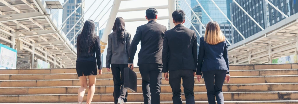 An ethnically diverse group of people ascend a staircase, signifying Neoskill is constantly growing with the L&D community, listening to our clients and keeping an ear [...] for new developments in training.