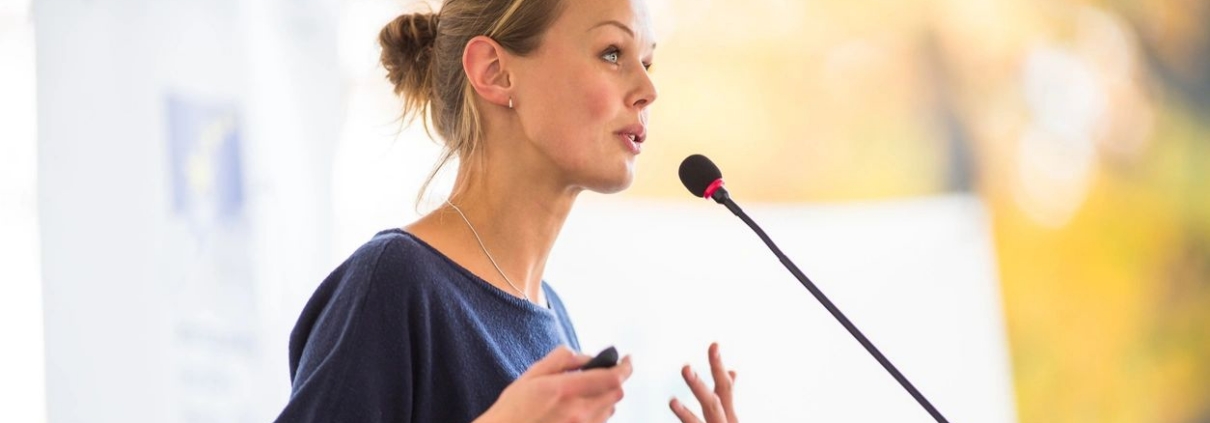 L&D representative talking into a mic