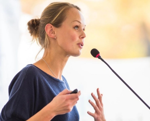 L&D representative talking into a mic